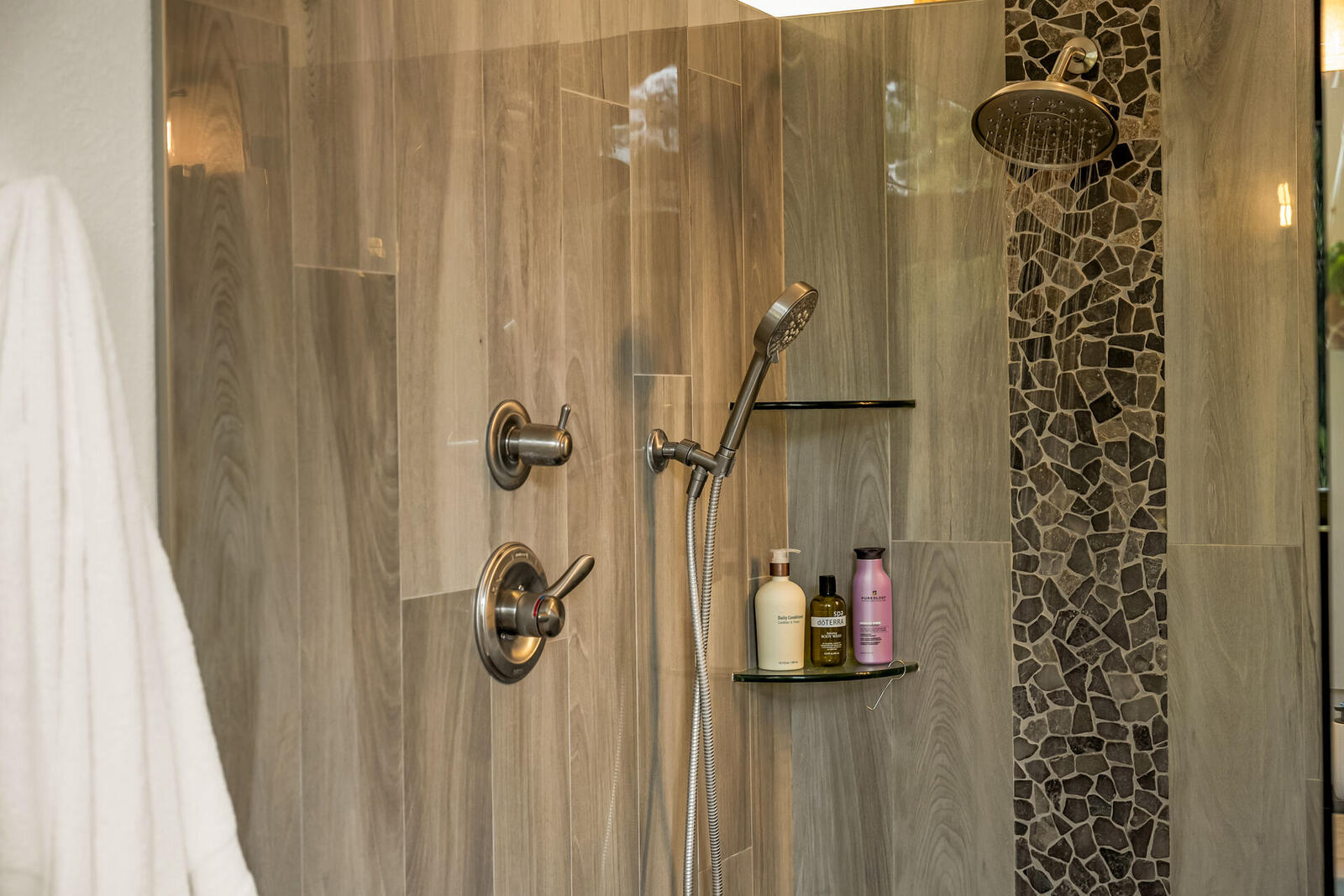 Primary bath pebble floor shower